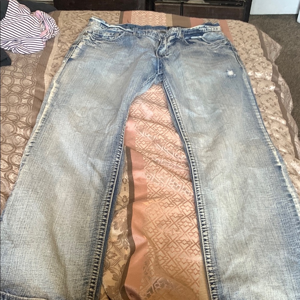 Women's Distressed Blue Jeans